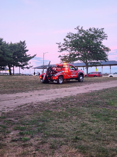 Quealy Towing Inc